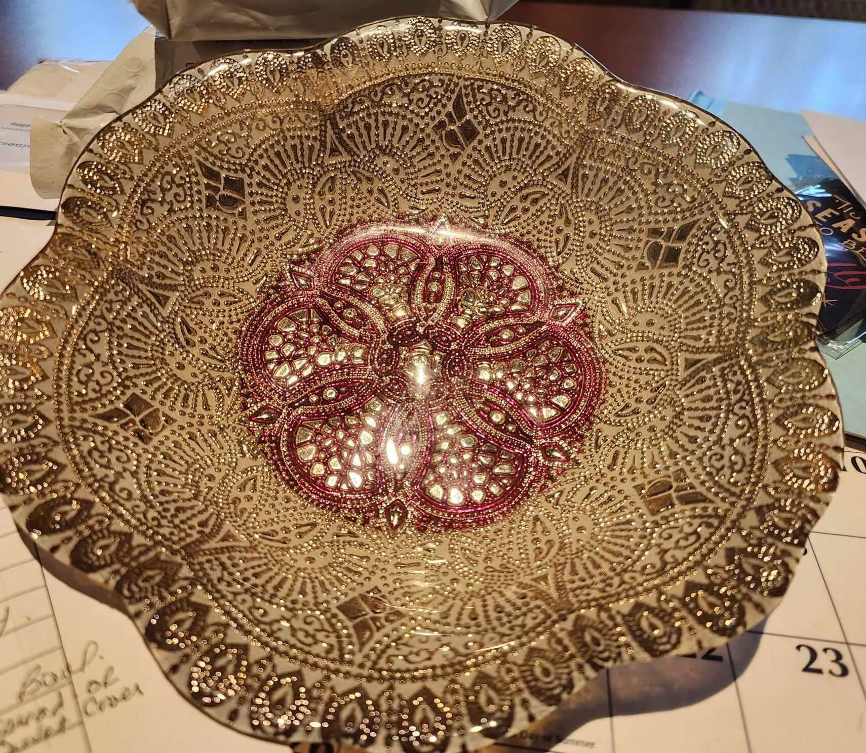 8 diameter Moroccan inspired by the master weavers a luminescent bowl is hand made of glass Hand decorated using gold leaf and layered with organic pigment